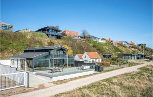 a house on the side of a hill at Awesome Home In Eg With Kitchen in Egå