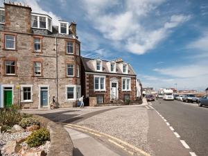 an old brick building on the side of a street at Bass Rock View in North Berwick