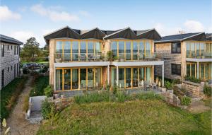 an aerial view of a house with a lot of windows at 2 Bedroom Gorgeous Apartment In Kerteminde in Kerteminde