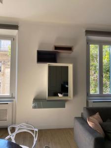 En TV eller et underholdningssystem på Trastevere Design Apartment