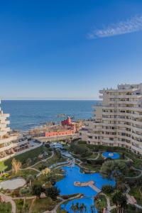 an aerial view of a resort and the ocean at Benalbeach Penthouse Sea View in Benalmádena
