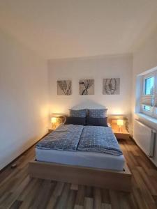 Postel nebo postele na pokoji v ubytování Ferienwohnung Sonneberg