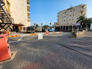 a street with a no entry sign in a city at מלון טיבריא in Tiberias