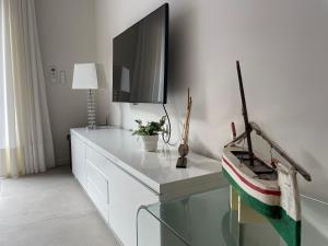 TV a/nebo společenská místnost v ubytování Apartament Antic Plankton - Sa Riera Begur - Free Parking, Beach, Wifi, Perfect holidays