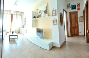 Кровать или кровати в номере Sunnyside Accademia