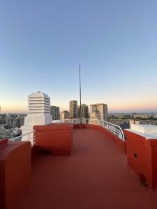 una vista desde el techo de un edificio con ciudad en Exotic Pent House with private terrace en Buenos Aires
