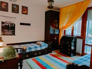 Кровать или кровати в номере Sunnyside Accademia