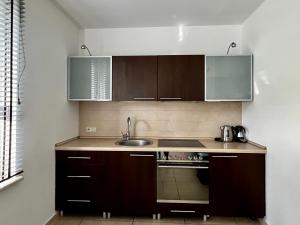 Kuchyňa alebo kuchynka v ubytovaní Apartamenty Villa Fiori - Wyspa Sobieszewska