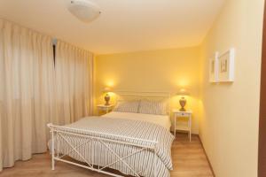 Voodi või voodid majutusasutuse Casa Fara - Plesio by LoveComo toas
