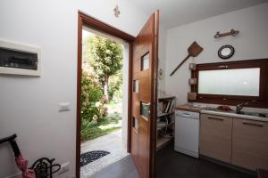 Kuchyňa alebo kuchynka v ubytovaní Castel Cottage - Rezzonico, San Siro by LoveComo