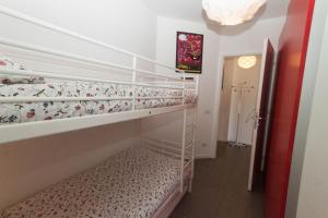 Postel nebo postele na pokoji v ubytování IsaBellaVista - Mezzegra, Tremezzina by LoveComo