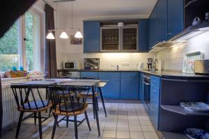 Kuchyň nebo kuchyňský kout v ubytování Strandvilla Hubertus - Suite Kandinsky