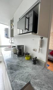 Una cocina o zona de cocina en Departamento entero super cómodo Airi House N3