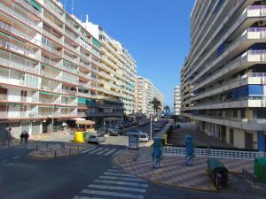 a view of a city street with tall buildings at Hotel Libertador in Cullera