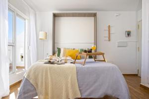 Posteľ alebo postele v izbe v ubytovaní -MalagaSunApts-Alcazaba Andalusian Dream