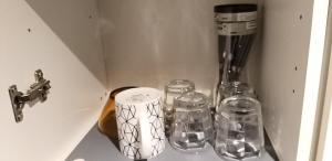 a drawer with two glass jars and a blender at Chambre équipée (proche Paris) in Argenteuil