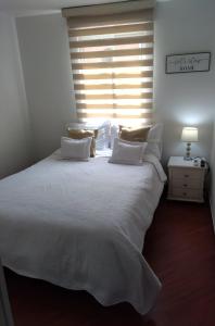 Cama o camas de una habitación en Hermoso apartamento en Salitre
