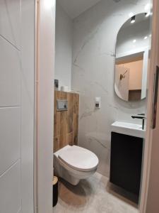 Kúpeľňa v ubytovaní City Center Studio Apartments + 37 fotografií
