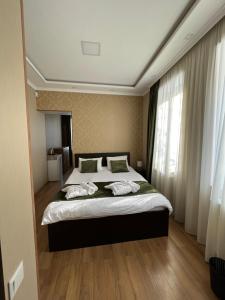 Katil atau katil-katil dalam bilik di Serenity Likani Villa Hotel