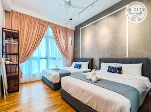 a bedroom with two beds and a large window at Paradigm Residence by JBcity Home in Johor Bahru