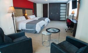 Postel nebo postele na pokoji v ubytování Hotel HR AMADA Cúcuta + 28 fotografií