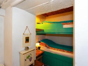 a bunk bed room with two bunk beds at Yellow - Uk43117 in Clynnog-fawr