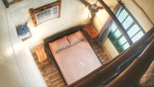 an overhead view of a bed in a room at Blue Sea Star Beach House Family Room for 6 in Calatagan