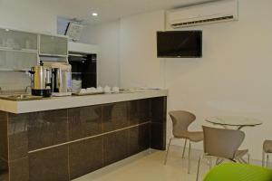 A cozinha ou cozinha compacta de Bora Hotel