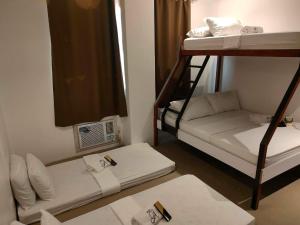 Postel nebo postele na pokoji v ubytování Hotel Rupert A Baler
