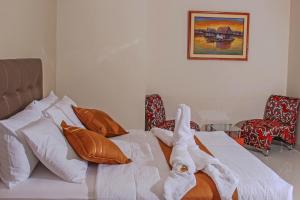 Postel nebo postele na pokoji v ubytování Bora Hotel