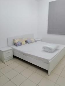 Postel nebo postele na pokoji v ubytování WN HOMES