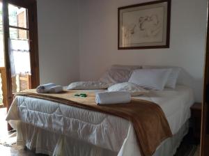 Cama o camas de una habitación en Pousada Sonho Verde