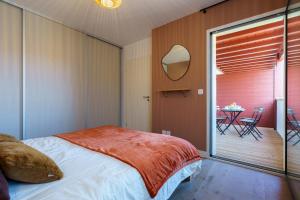 Postel nebo postele na pokoji v ubytování Confort-Appartement Le Banquet