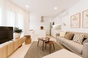 Posezení v ubytování Lavaderos Suites