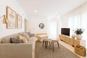 TV a/nebo společenská místnost v ubytování Lavaderos Suites