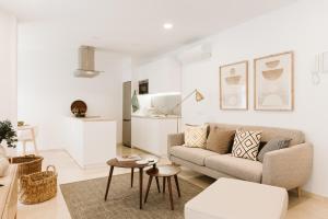 Posezení v ubytování Lavaderos Suites