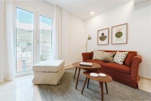 Posezení v ubytování Lavaderos Suites