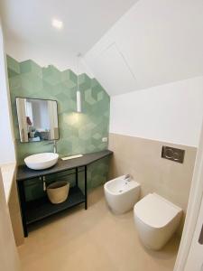 Ένα μπάνιο στο Residence Le Tre Grazie - Appartamento Tàlia +7 φωτογραφίες