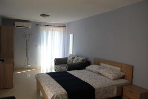 Ein Bett oder Betten in einem Zimmer der Unterkunft Villa Malina new