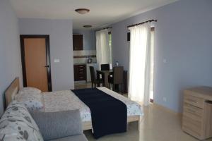 Ein Bett oder Betten in einem Zimmer der Unterkunft Villa Malina new