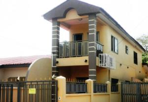 a building with a fence in front of it at Marrets International Hotel - "Express" in Cape Coast