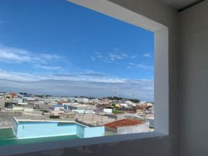 a view of a city from a window at Nomad Stay in Phan Rang–Tháp Chàm