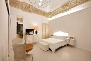 A bed or beds in a room at Dimora San Giuseppe