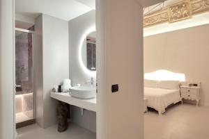 A bed or beds in a room at Dimora San Giuseppe