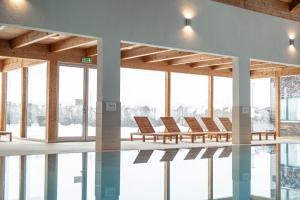 Bazén v ubytovaní FerienPark Kreischberg by ALPS RESORTS alebo v jeho blízkosti