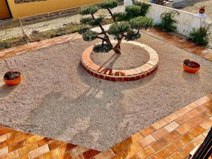 Vonkajšia záhrada v ubytovaní 'Coll de Rates' Beautiful 1-Bed Apartment