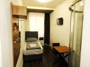 Letto o letti in una camera di Hotel Hecht