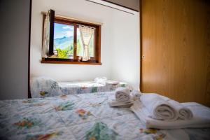 Letto o letti in una camera di Hotel Marguareis