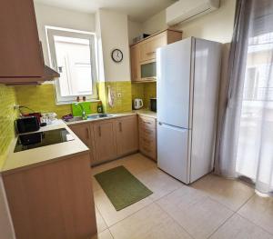 Kuchyň nebo kuchyňský kout v ubytování Tamar's place