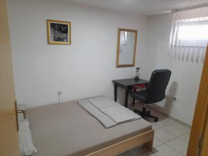 Posteľ alebo postele v izbe v ubytovaní Apartman Harfa 3
